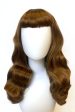 Brown 1950s pinup style wig, with long waves and a short fringe: Rosie Discount