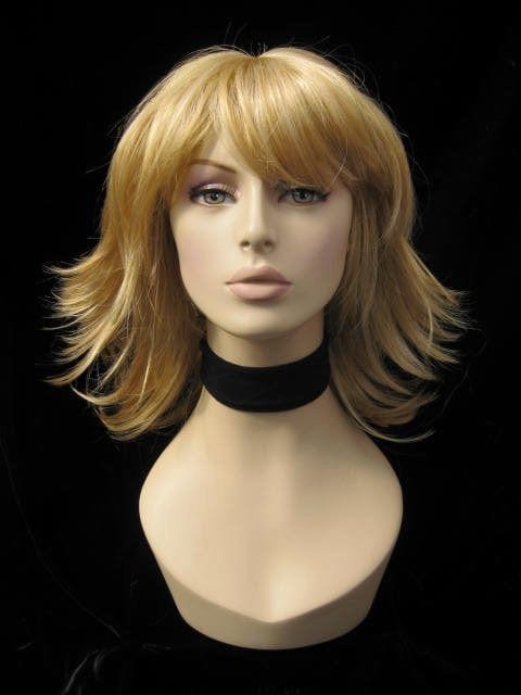 Warm blonde wig with flicked tips: Mary Online Sale