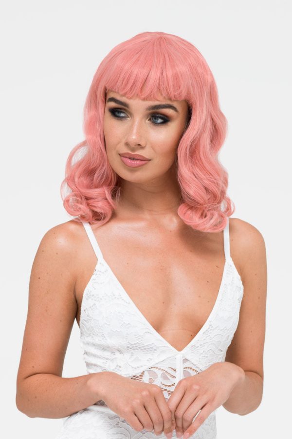 Pink pinup style wig, with finger waves and a short fringe, 1950s style: Stevie Fashion