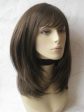 Chocolate brown wig with blonde highlights, face frame style: Katie Cheap