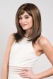 Chocolate brown wig with blonde highlights, face frame style: Katie Cheap